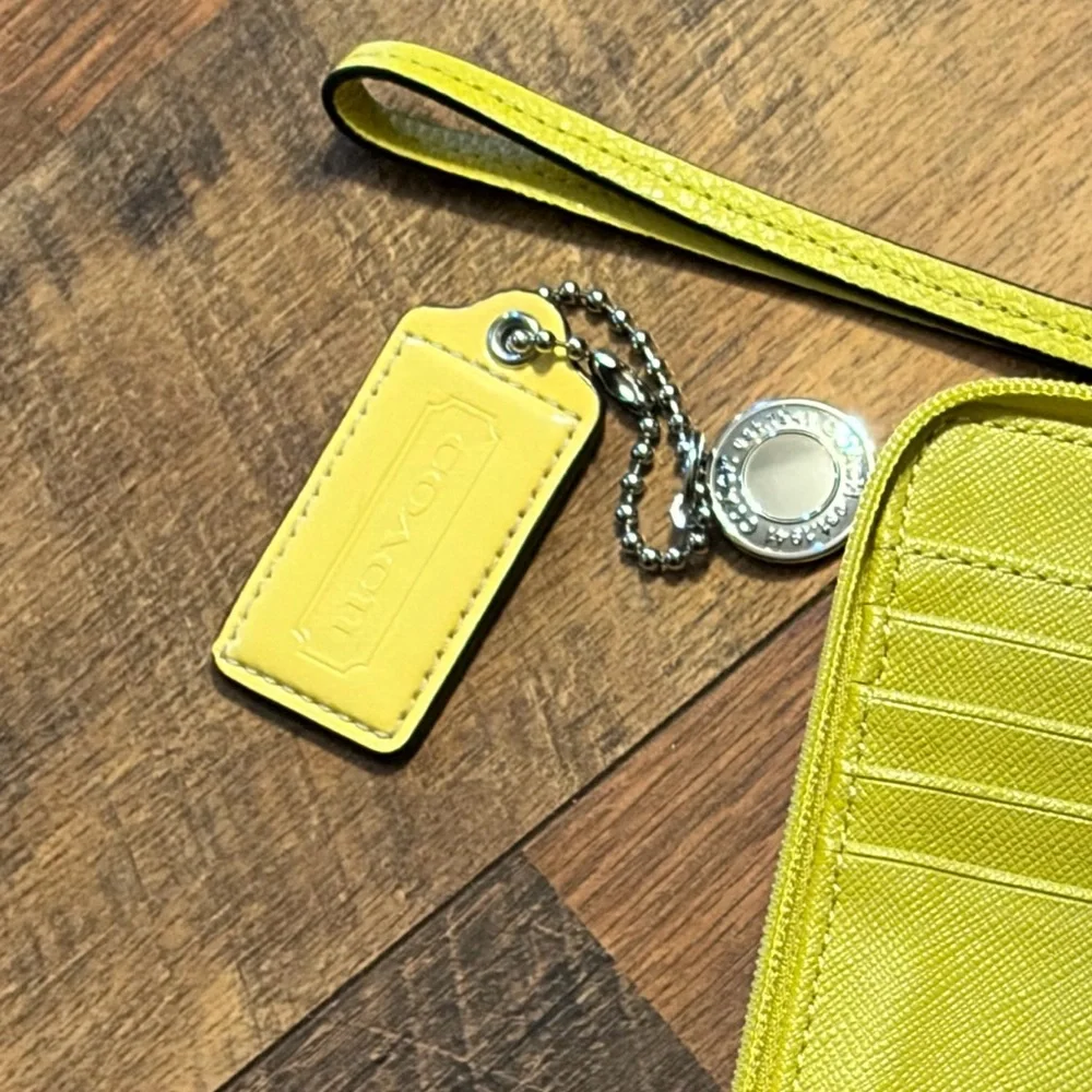 COACH Yellow Leather Wristlet Phone Case